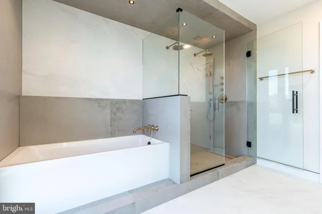 a view of a patio with chairs and potted plants