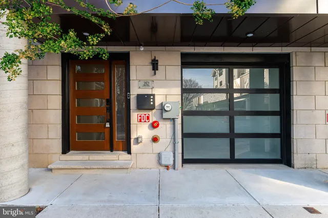 a kitchen with stainless steel appliances granite countertop a stove and a refrigerator