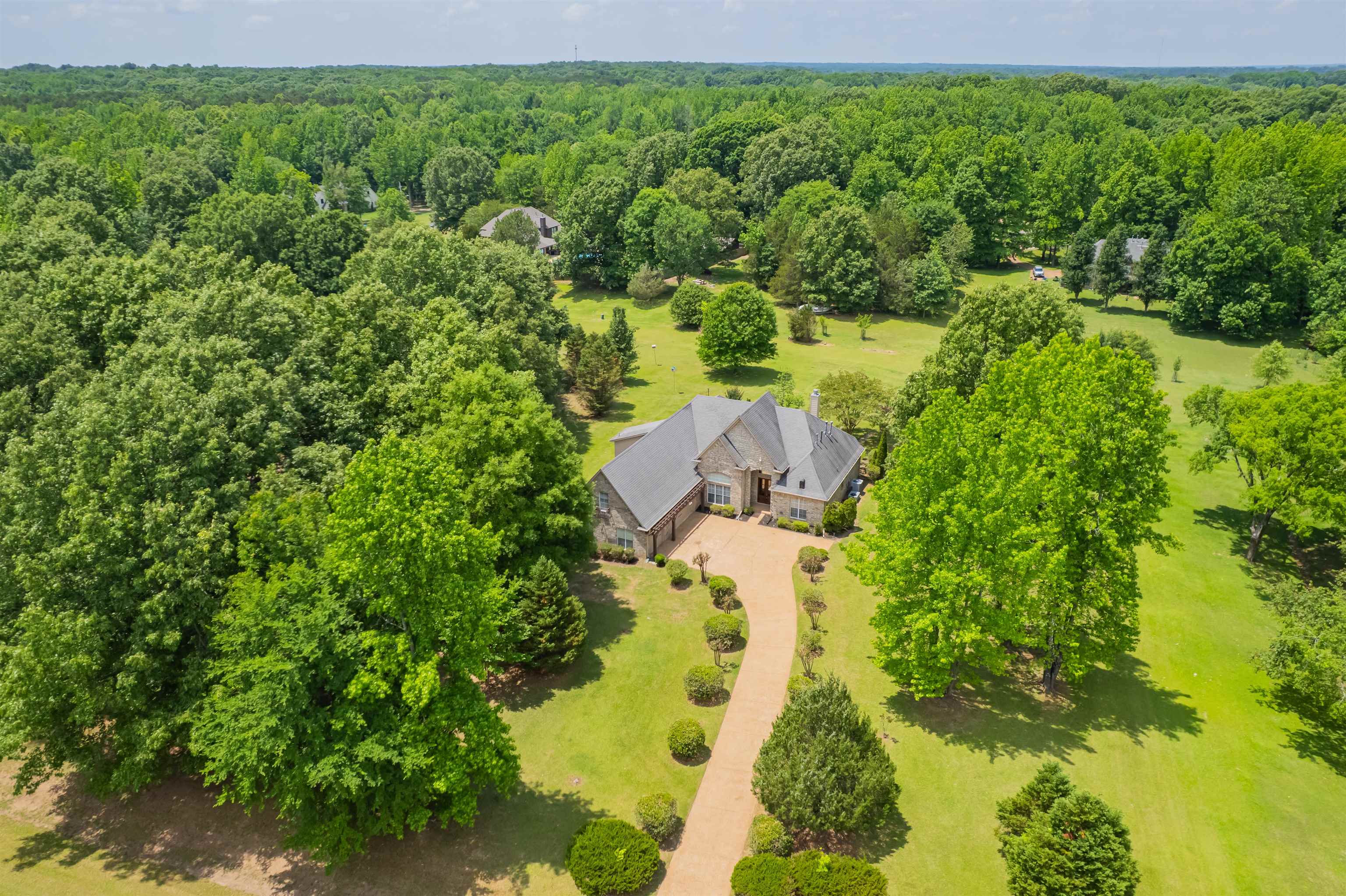 5035 Brian Ridge Road Arlington, TN 38002 - Photo 3 of 40 Estate residence surrounded by mature trees and manicured lawns