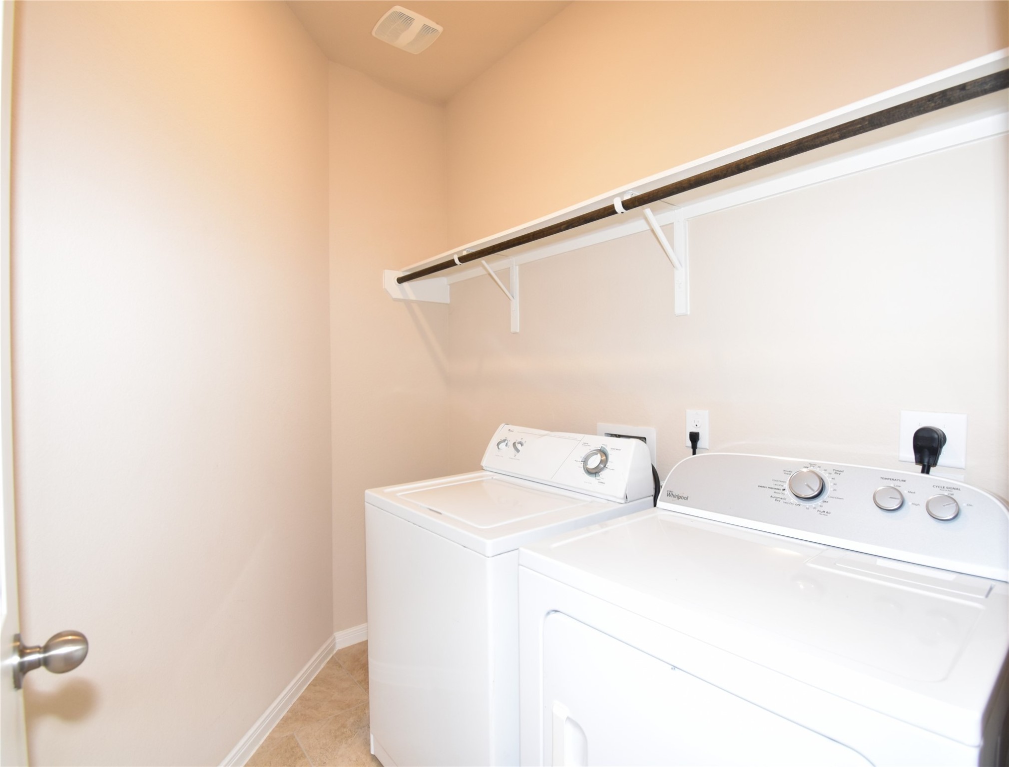 22219 Ebbets Field Drive Spring, TX 77389 - Photo 12 of 22 a utility room with dryer and washer
