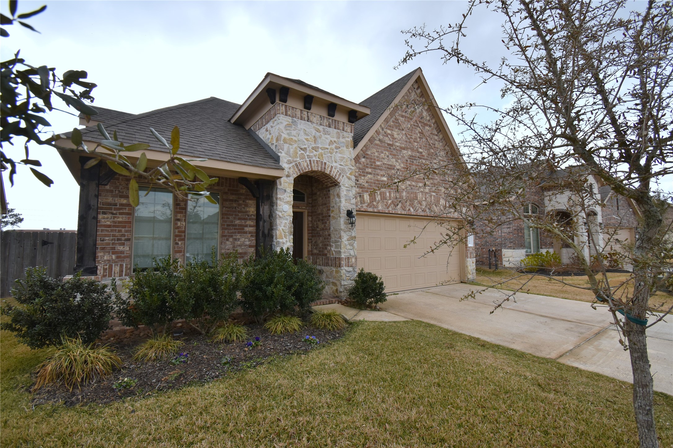 22219 Ebbets Field Drive Spring, TX 77389 - Photo 3 of 22 a front view of house with yard and green space