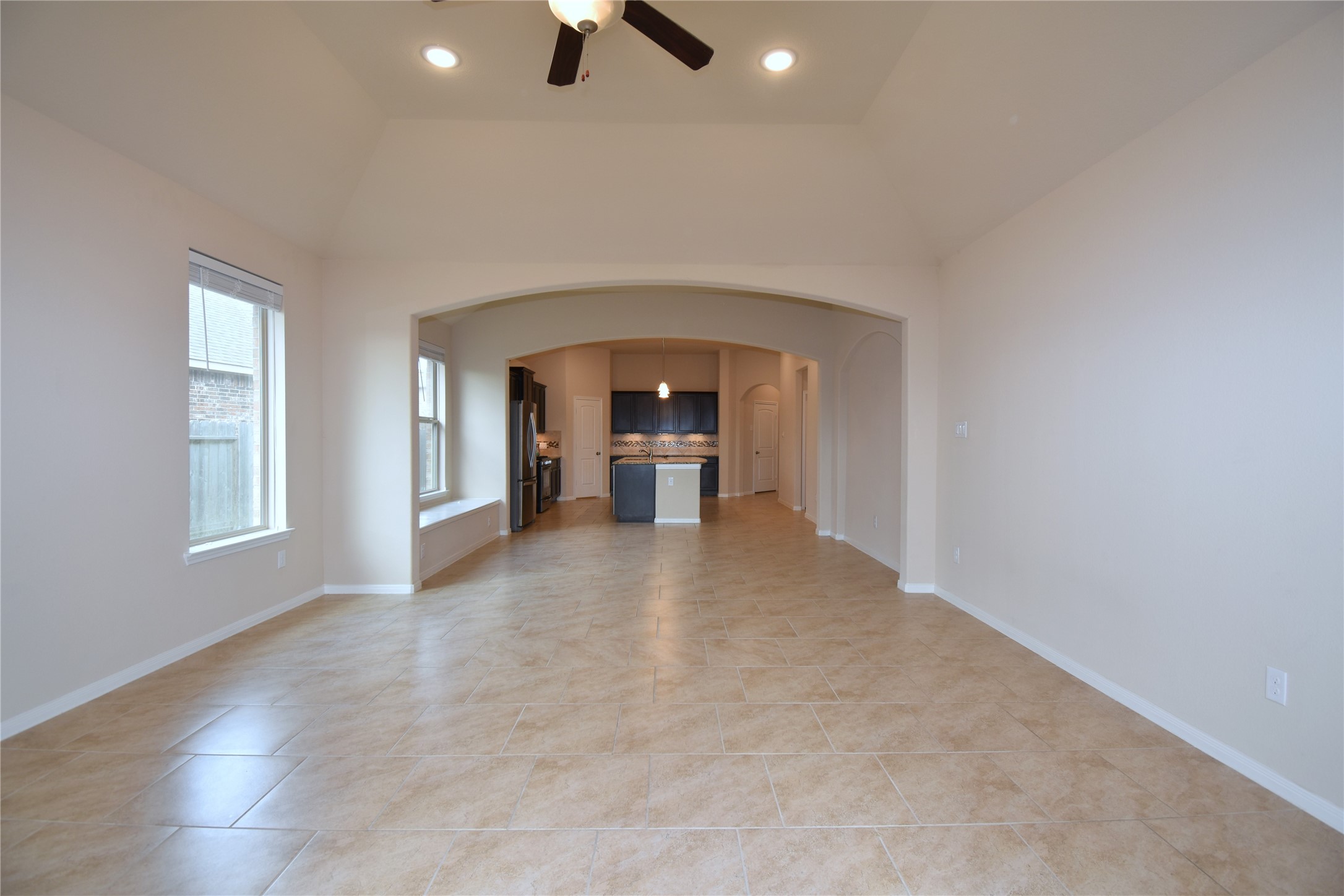 22219 Ebbets Field Drive Spring, TX 77389 - Photo 8 of 22 wooden floor in an empty room with a window