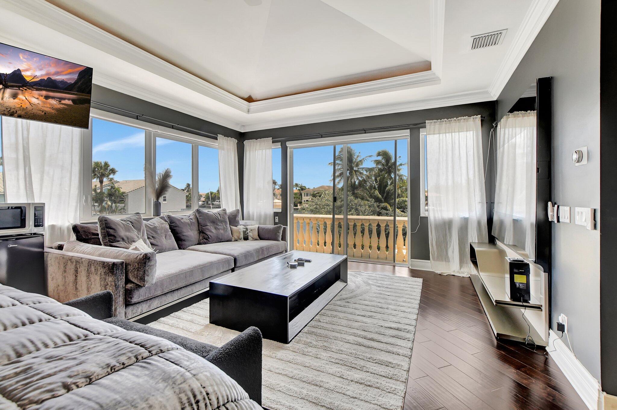 857 Havana Drive Boca Raton, FL 33487 - Photo 13 of 30 a living room with furniture and a large window