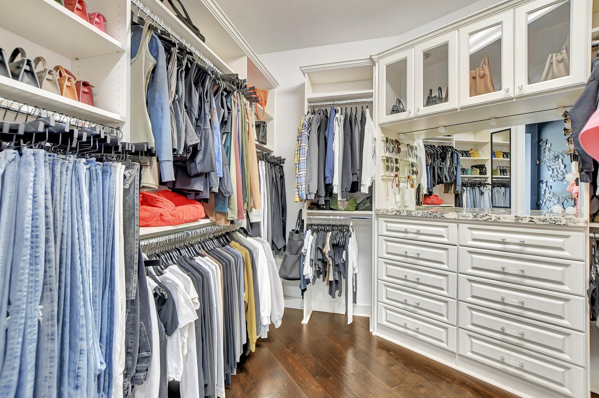 857 Havana Drive Boca Raton, FL 33487 - Photo 16 of 30 a view of walk in closet with clothes and shoes