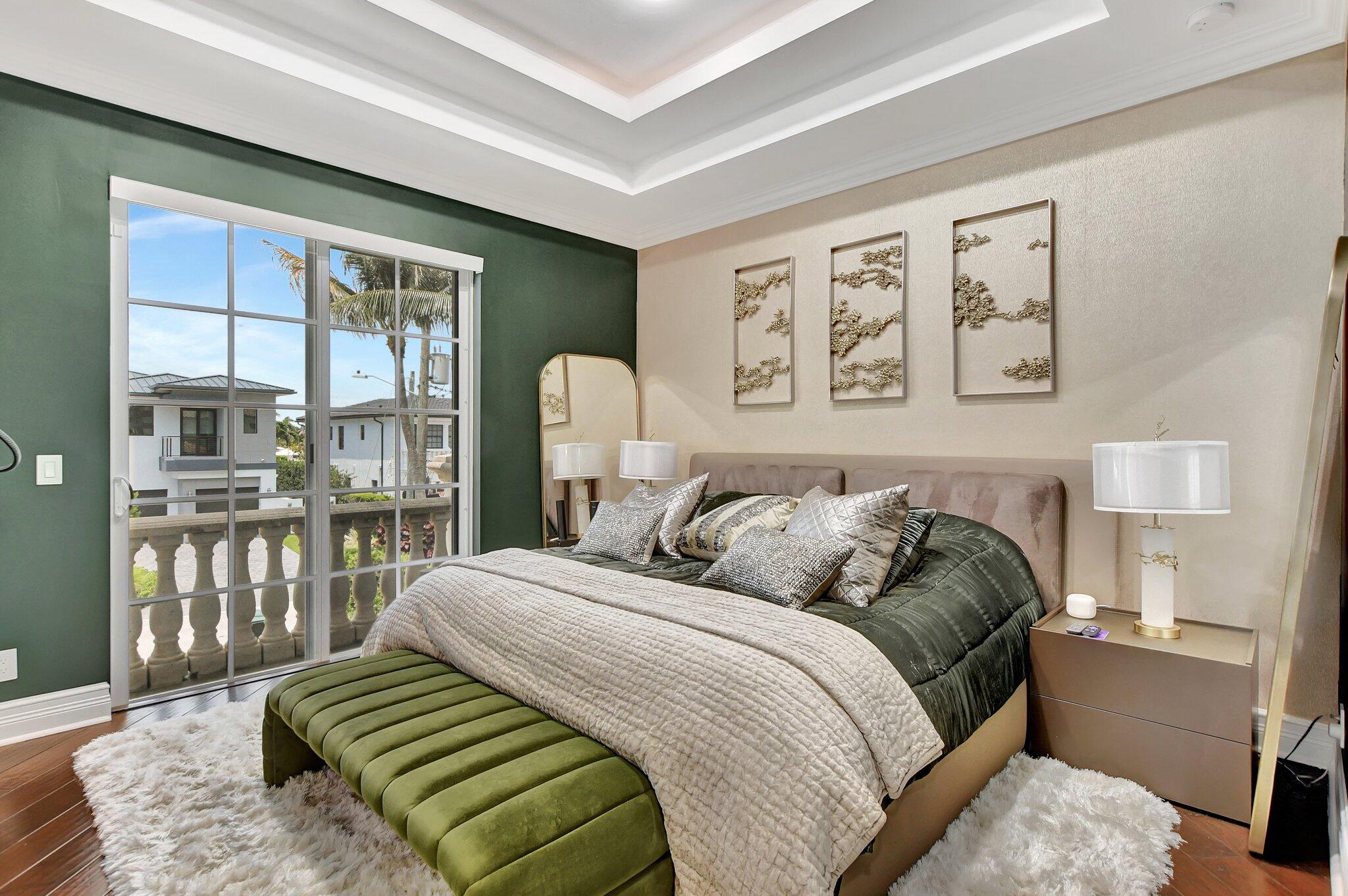 857 Havana Drive Boca Raton, FL 33487 - Photo 18 of 30 a bedroom with a bed and a large window