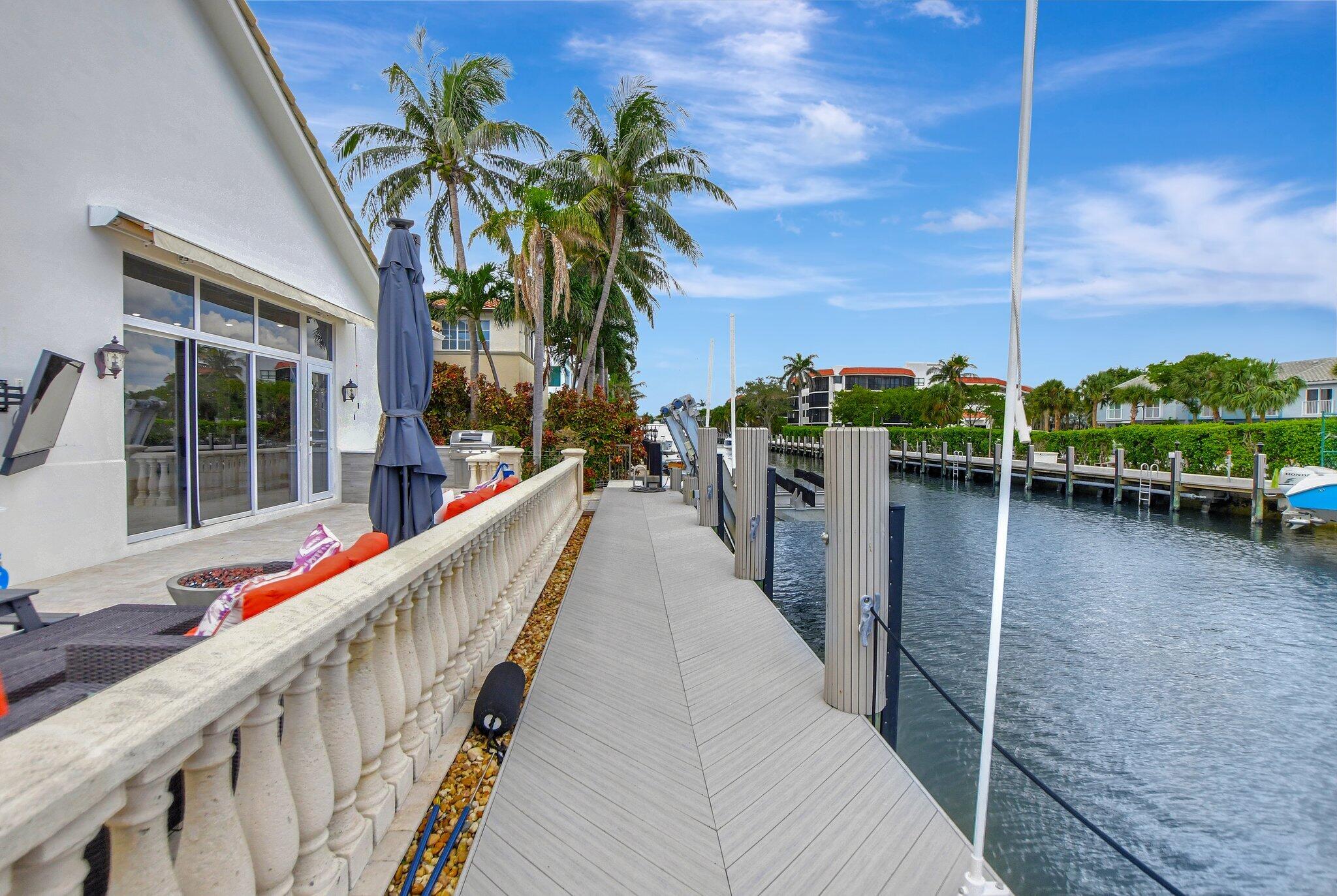 857 Havana Drive Boca Raton, FL 33487 - Photo 22 of 30 a balcony with table and chairs
