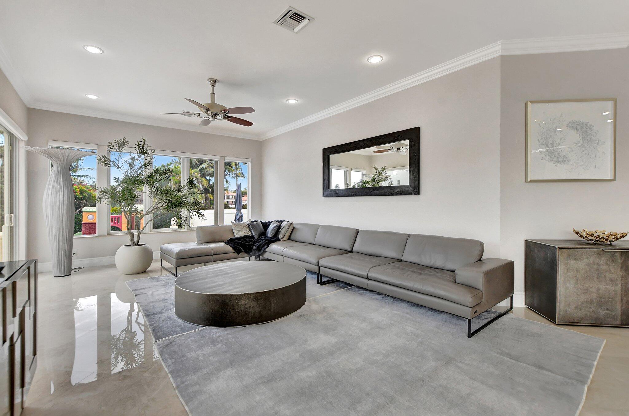 857 Havana Drive Boca Raton, FL 33487 - Photo 5 of 30 a living room with furniture and a large window