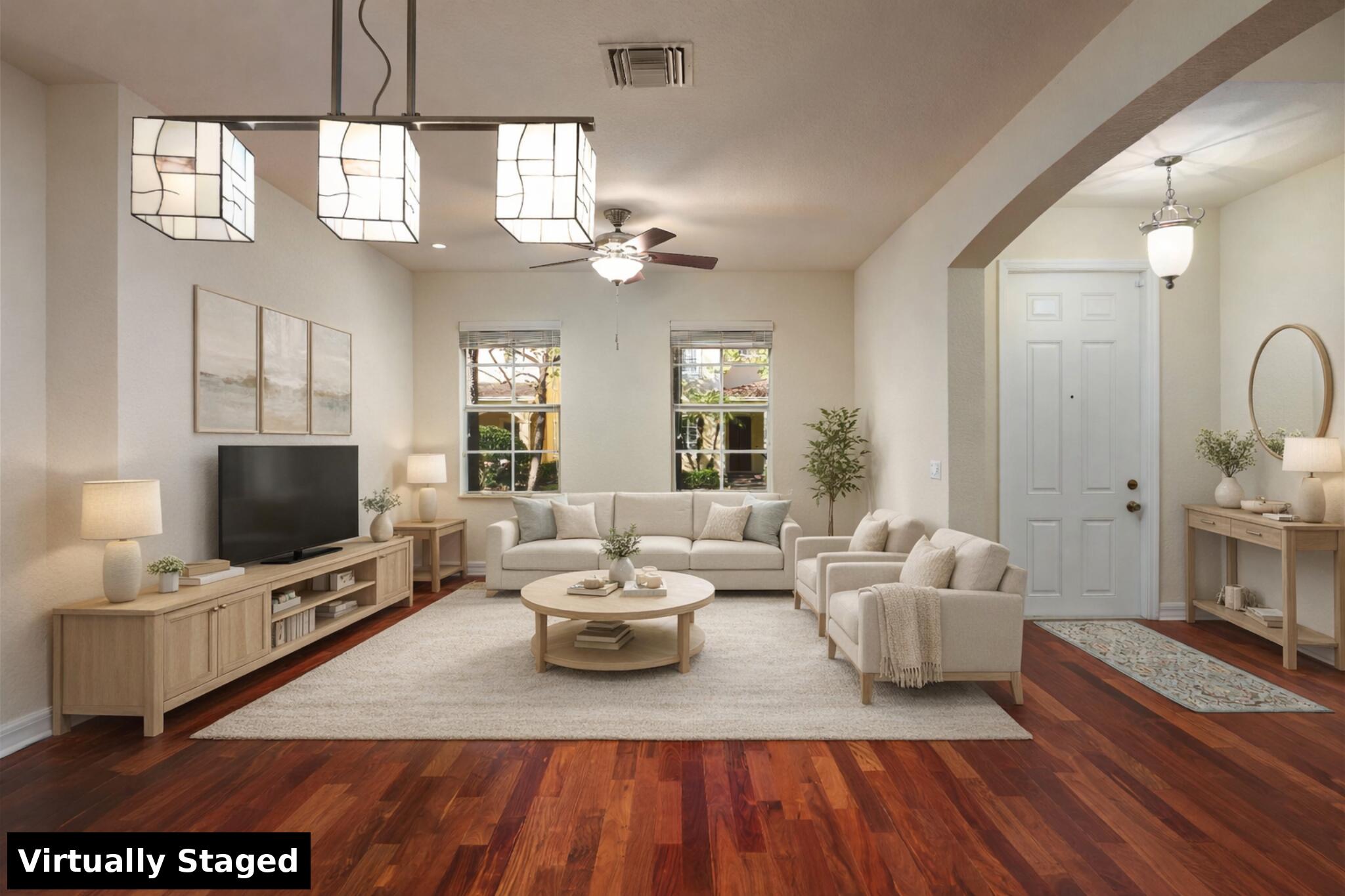 118 Foxford Court Jupiter, FL 33458 - Photo 3 of 35 Front Living Room - Virtually Staged