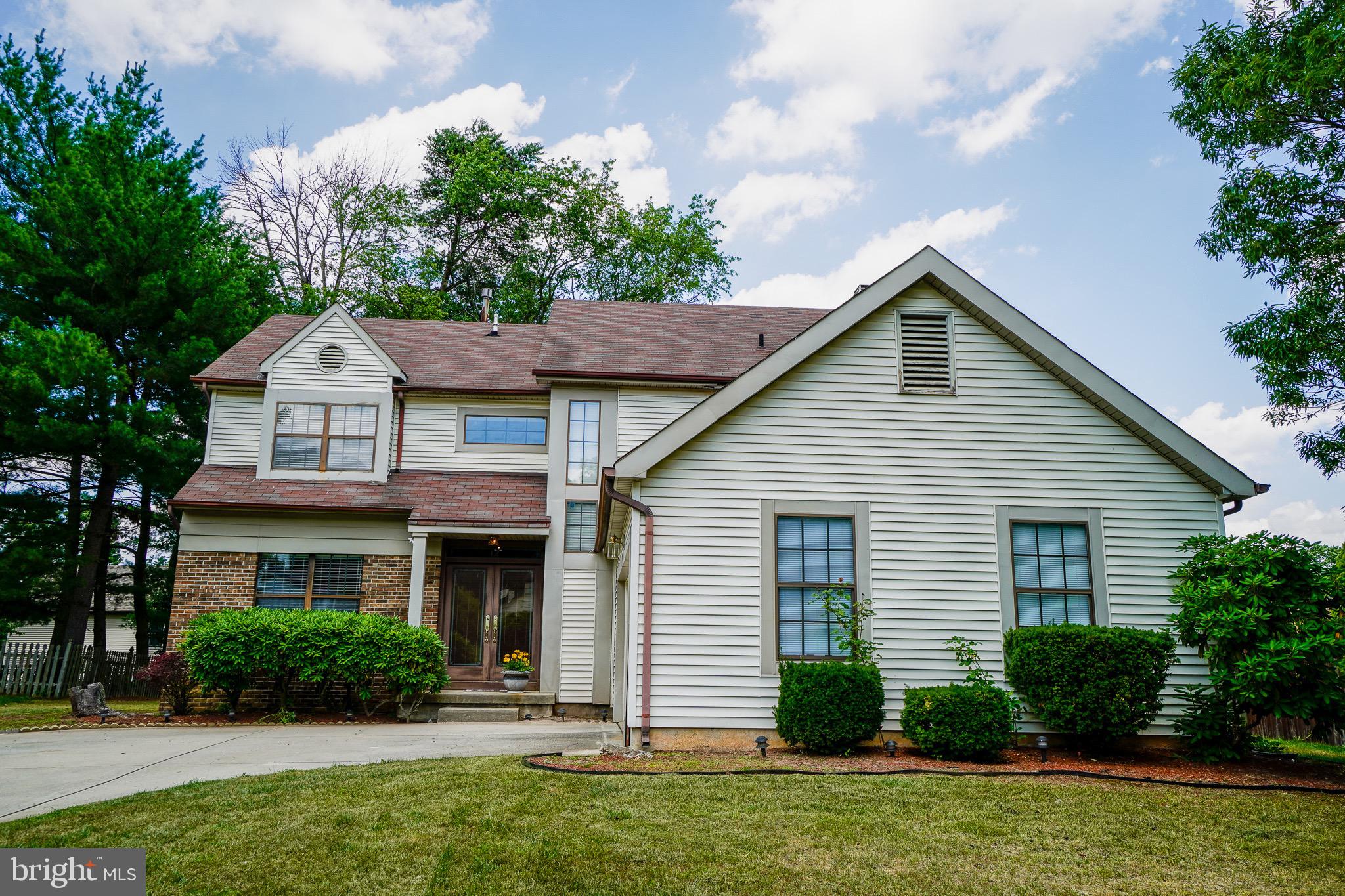 12 Blue Grass Road Clementon, NJ 08021 - Photo 1 of 23 a front view of a house with a yard