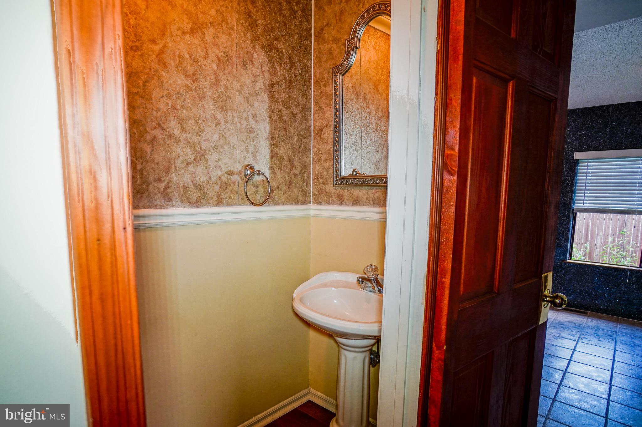 12 Blue Grass Road Clementon, NJ 08021 - Photo 13 of 23 a bathroom with a sink and a toilet