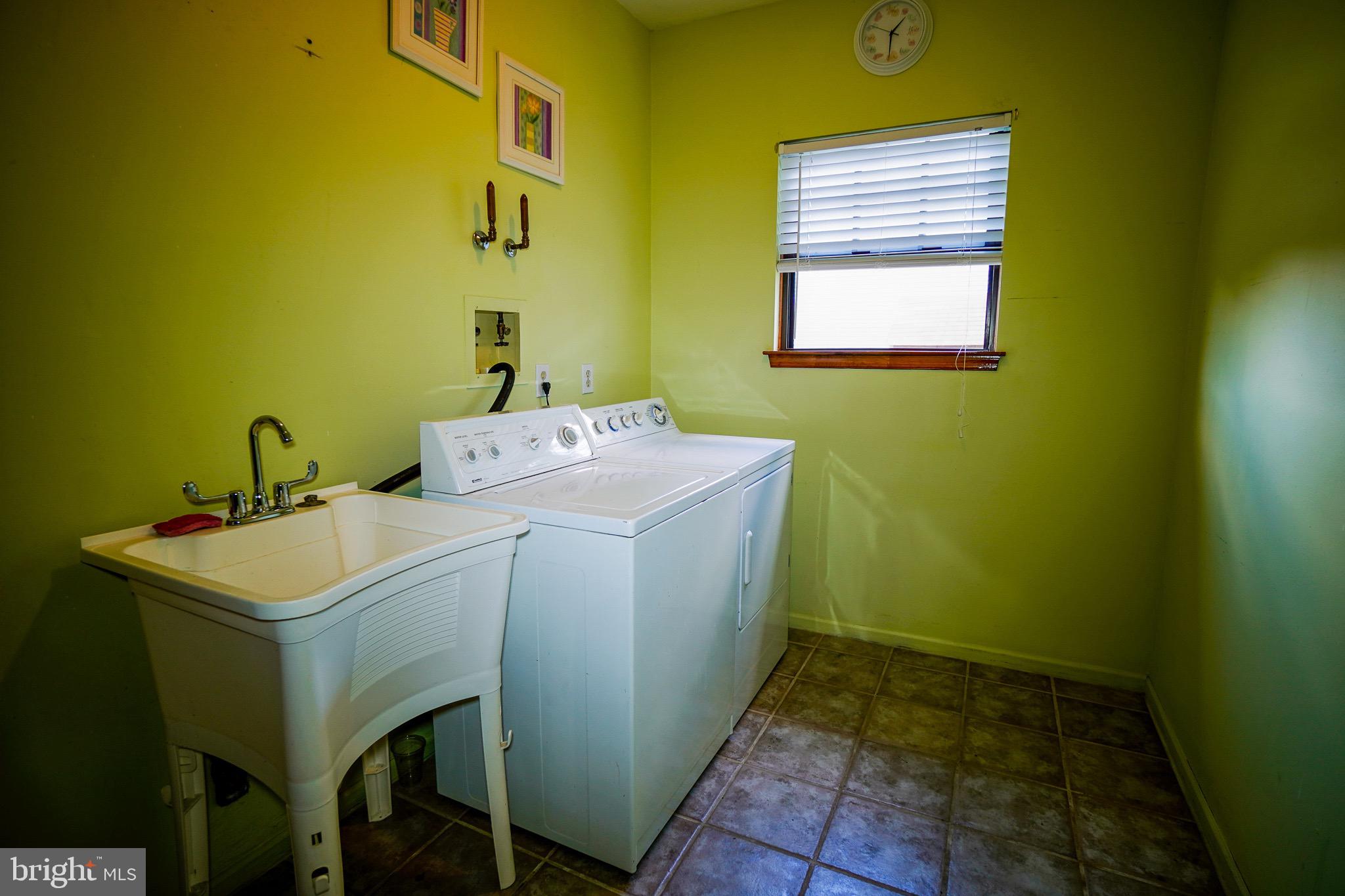 12 Blue Grass Road Clementon, NJ 08021 - Photo 14 of 23 a utility room with dryer and washer
