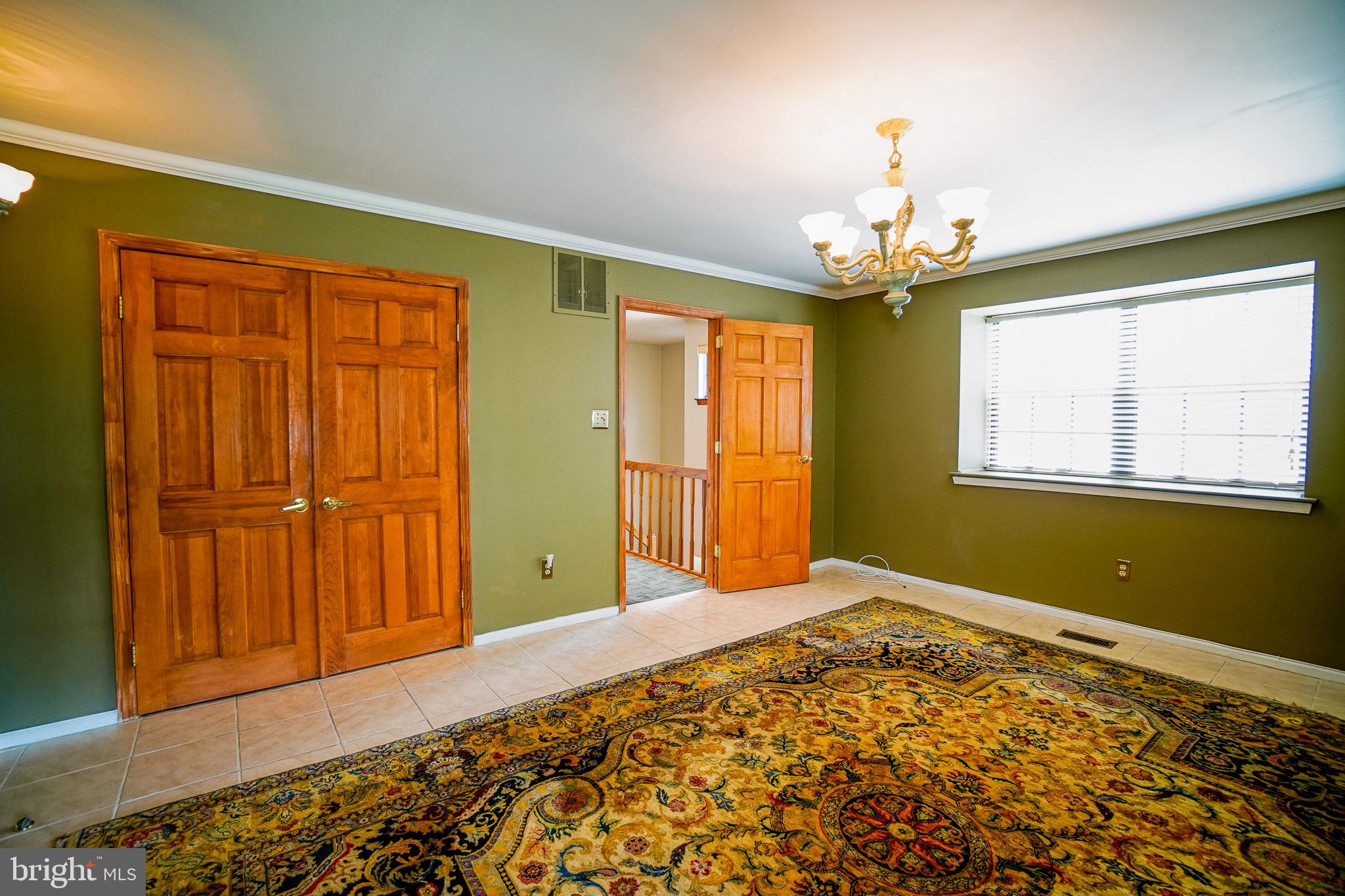 12 Blue Grass Road Clementon, NJ 08021 - Photo 16 of 23 a view of an empty room with a window