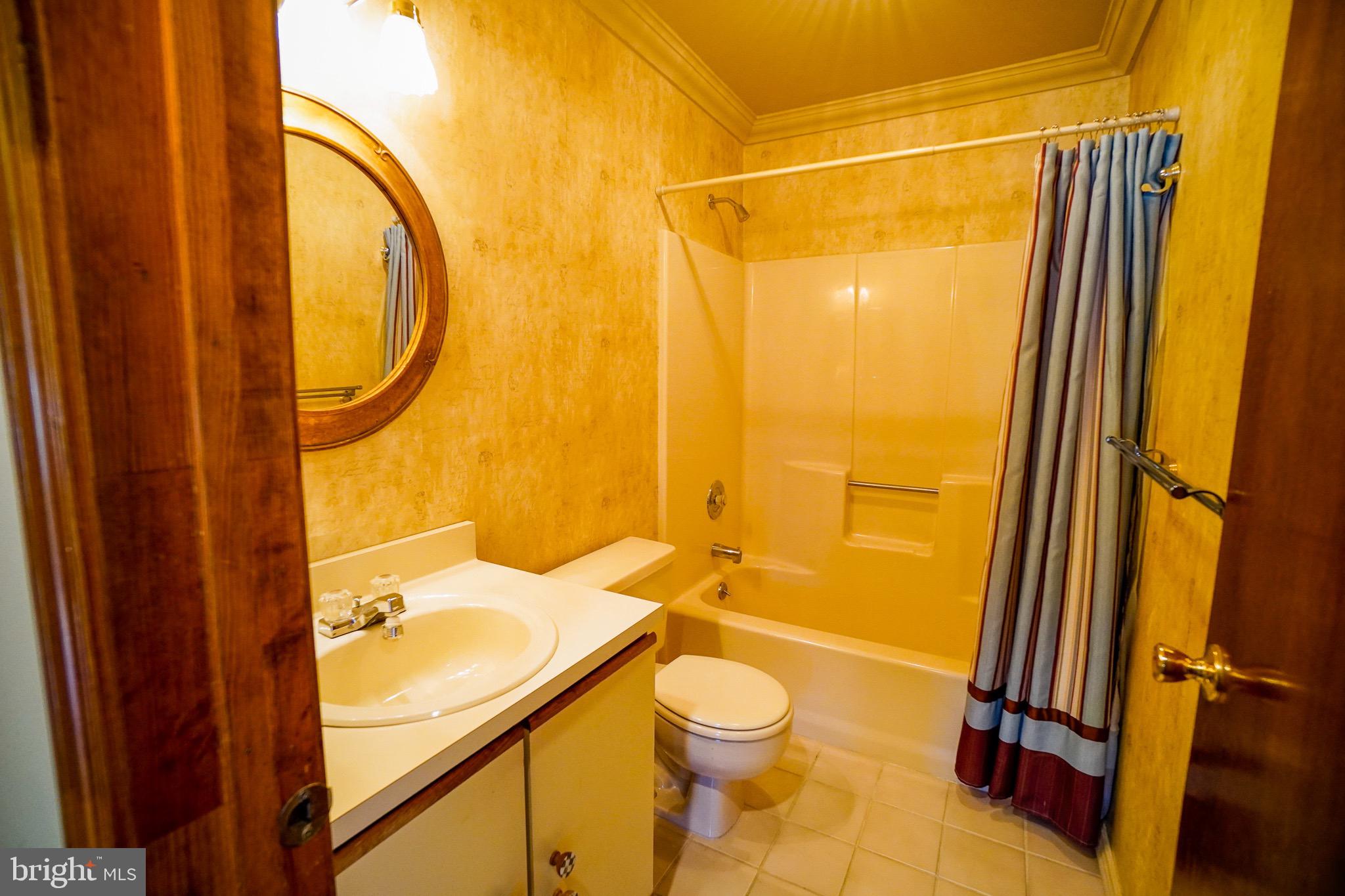 12 Blue Grass Road Clementon, NJ 08021 - Photo 17 of 23 a bathroom with a granite countertop sink toilet and shower