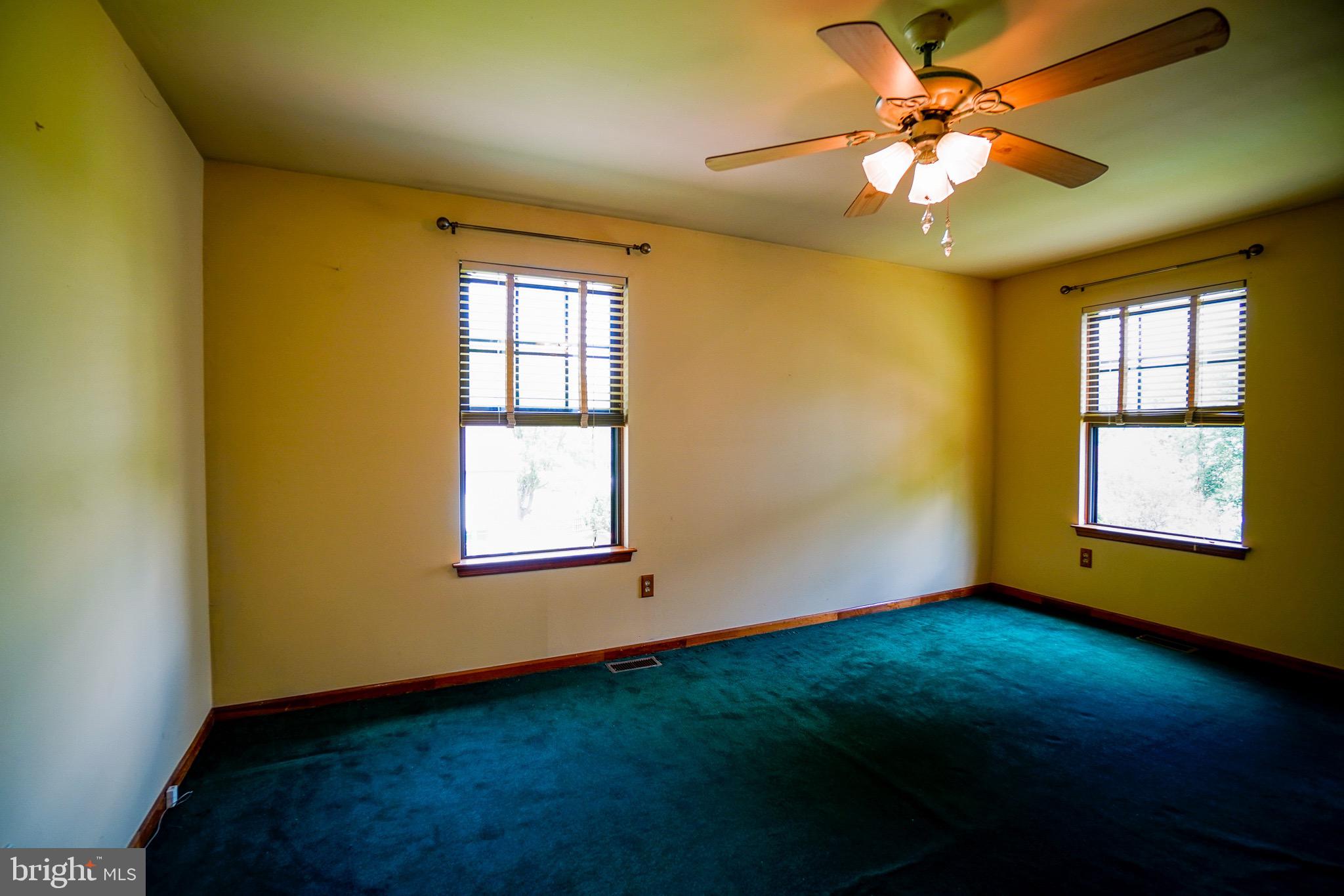 12 Blue Grass Road Clementon, NJ 08021 - Photo 20 of 23 a view of an empty room with a window