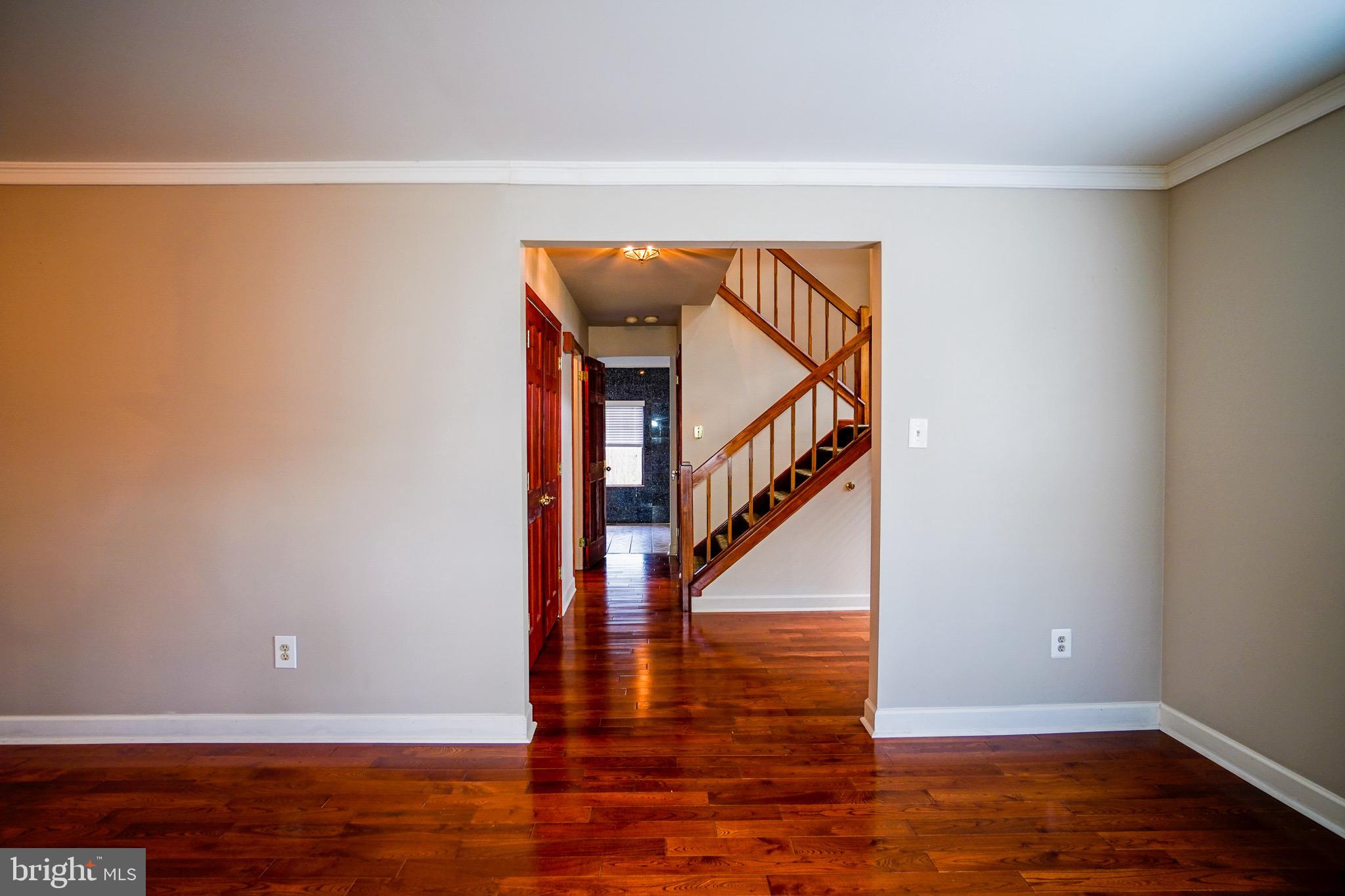 12 Blue Grass Road Clementon, NJ 08021 - Photo 6 of 23 a view of entryway and hall with wooden floor