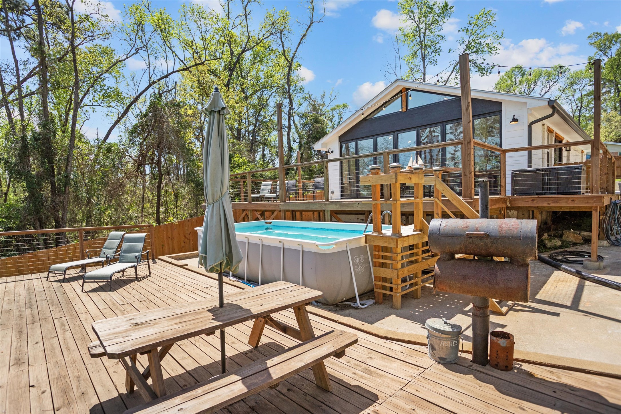 120 Cliff Street Point Blank, TX 77364 - Photo 19 of 30 Back view of the extended outdoor patio