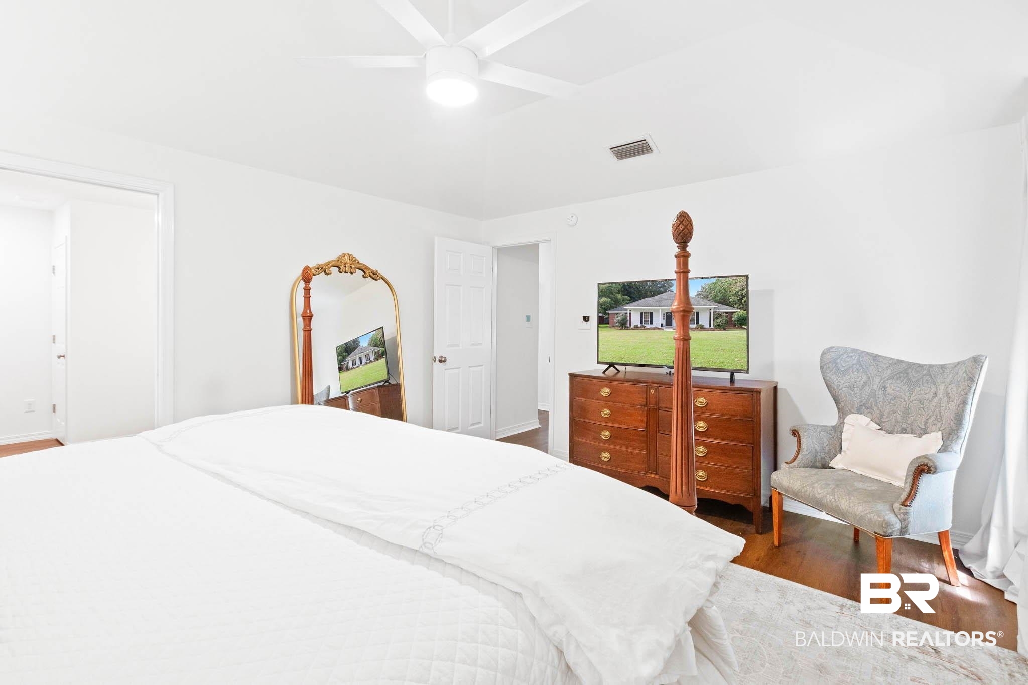 20685 Lowry Drive Fairhope, AL 36532 - Photo 24 of 48 Bedroom featuring wood finished floors and ceiling fan