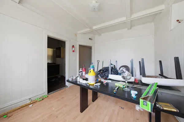 a view of a workspace with furniture