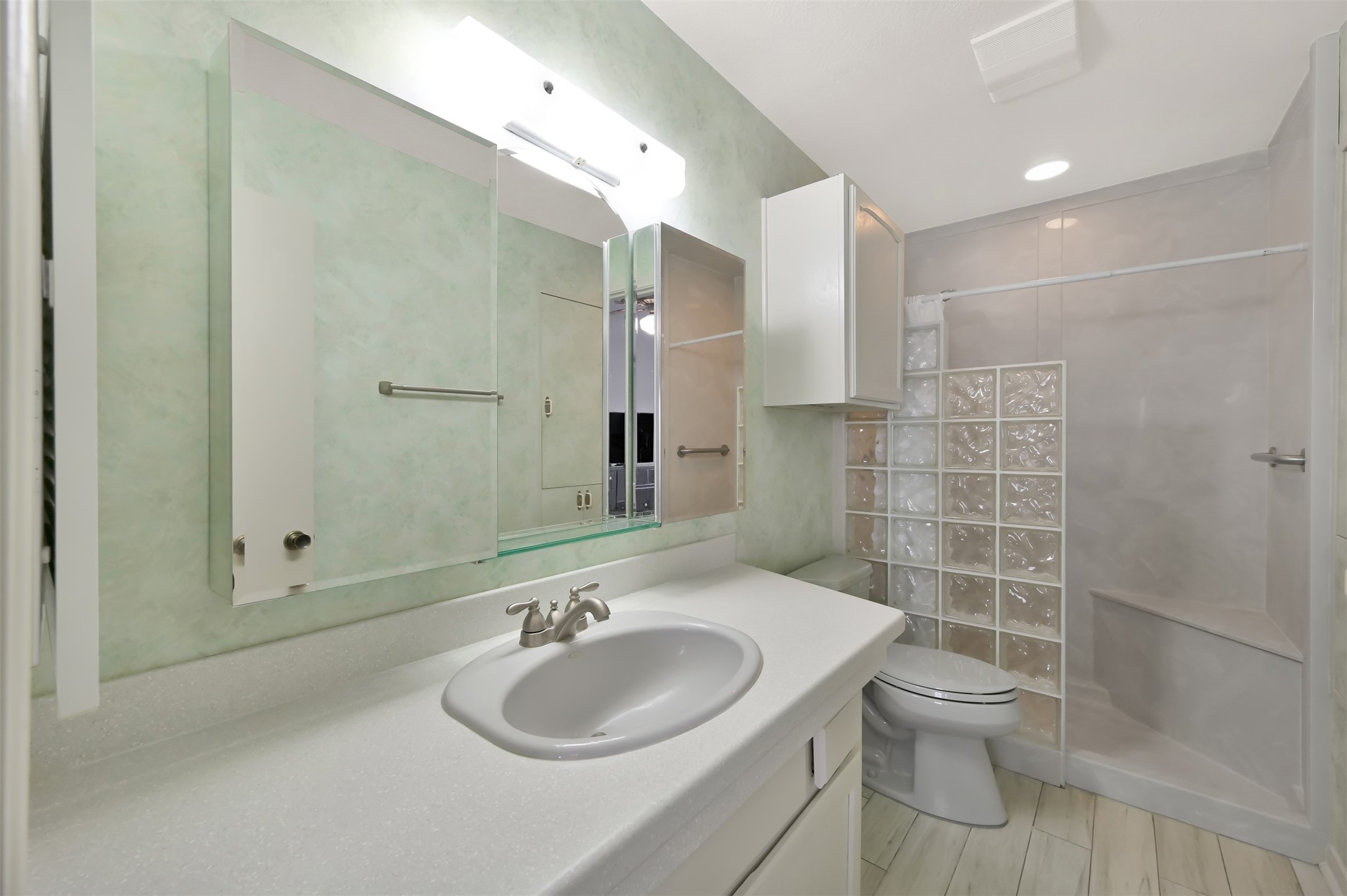 35 Lakeview Village Conroe, TX 77356 - Photo 22 of 34 a bathroom with a sink toilet and shower