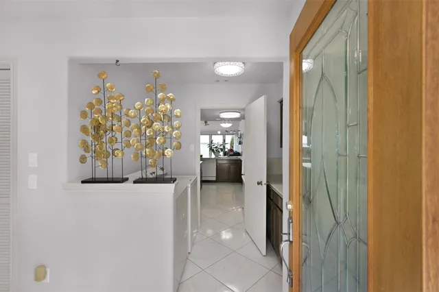a view of a hallway and dining room