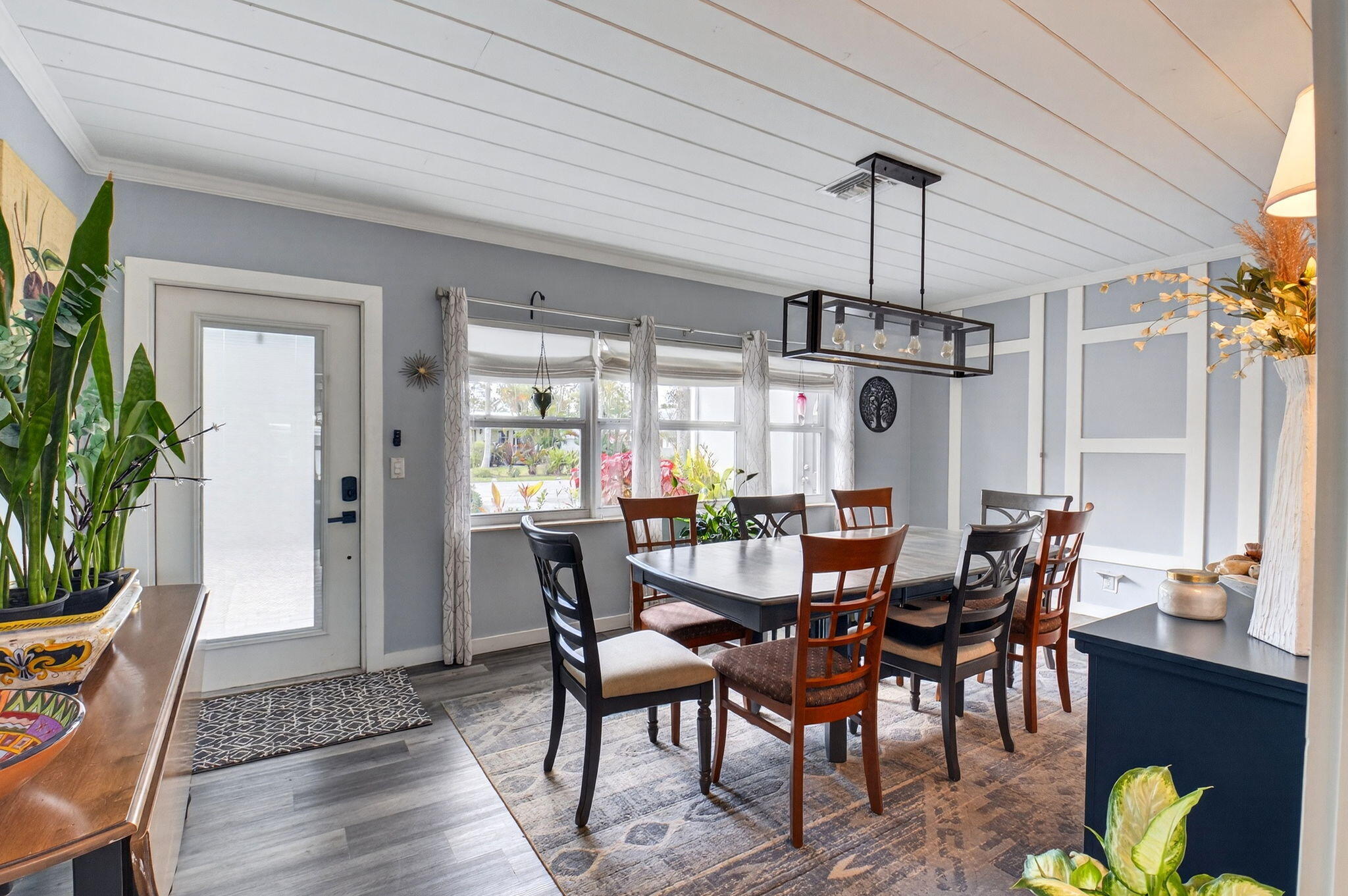 233 Northeast 12th Street Delray Beach, FL 33444 - Photo 11 of 55 a view of a dining room with furniture window and wooden floor