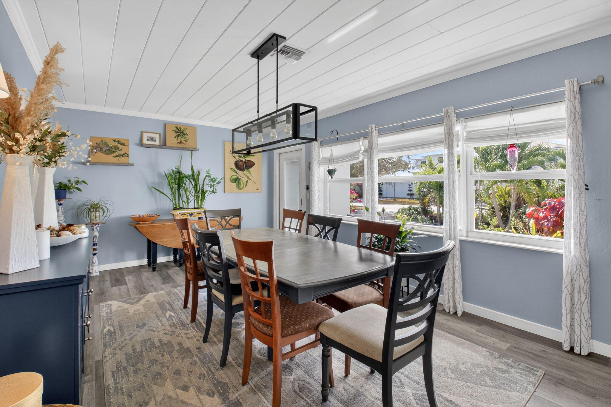 233 Northeast 12th Street Delray Beach, FL 33444 - Photo 14 of 55 a view of a dining room with furniture window and outside view
