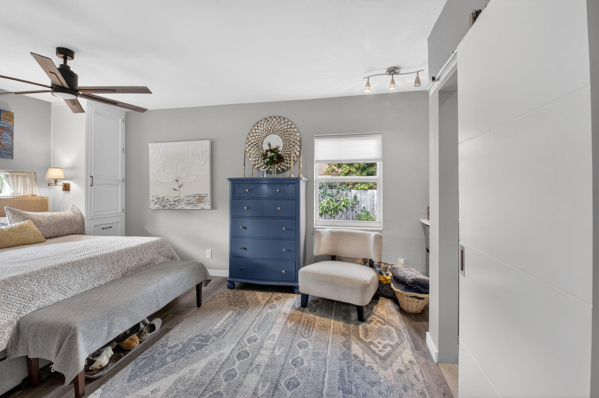 233 Northeast 12th Street Delray Beach, FL 33444 - Photo 16 of 55 a spacious bedroom with a bed and a window