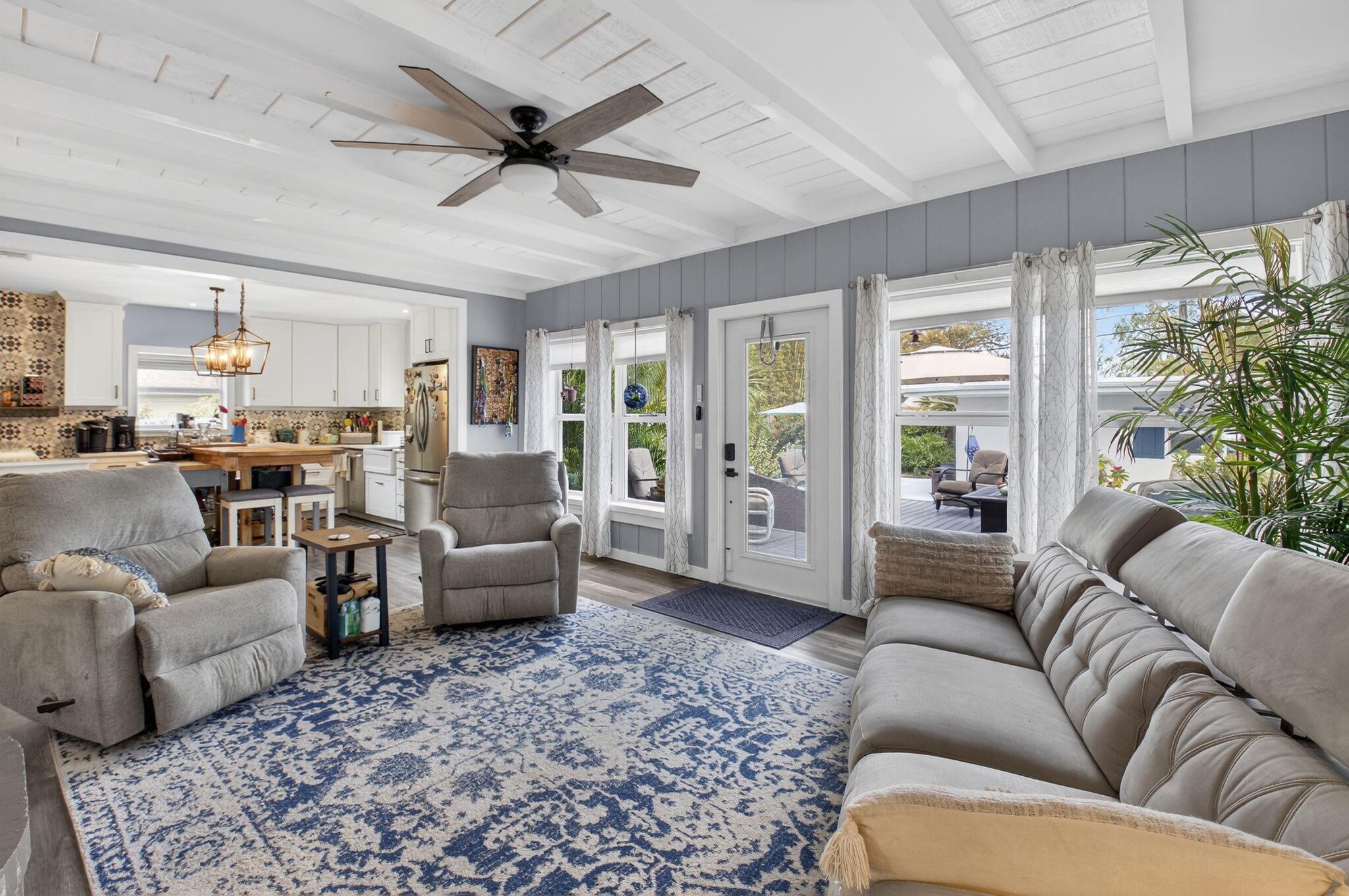 233 Northeast 12th Street Delray Beach, FL 33444 - Photo 26 of 55 a living room with furniture and a large window