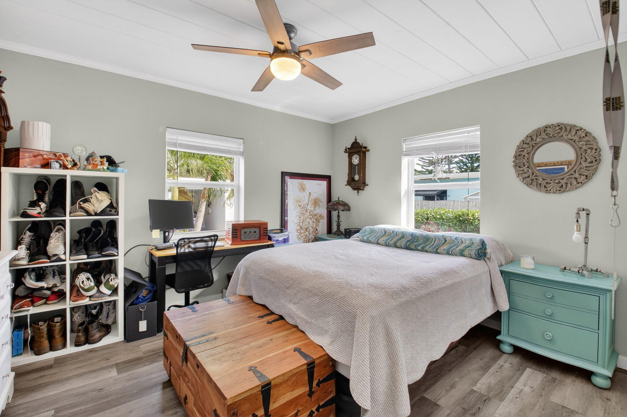 233 Northeast 12th Street Delray Beach, FL 33444 - Photo 33 of 55 a bedroom with a bed and a bookshelf