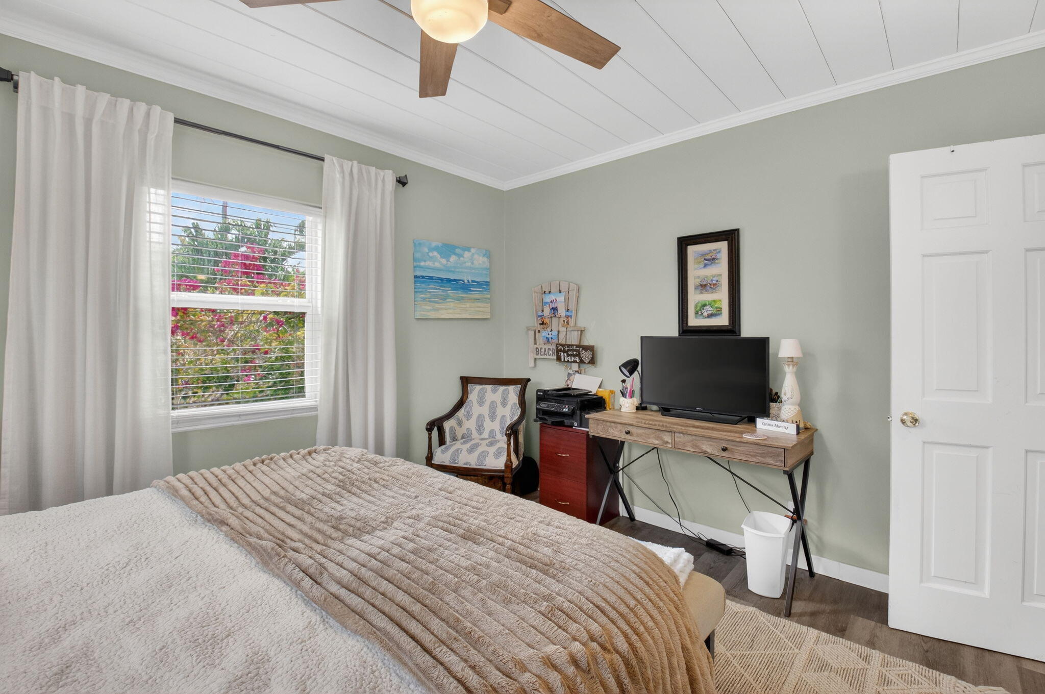 233 Northeast 12th Street Delray Beach, FL 33444 - Photo 36 of 55 a bedroom with a bed and a flat screen tv