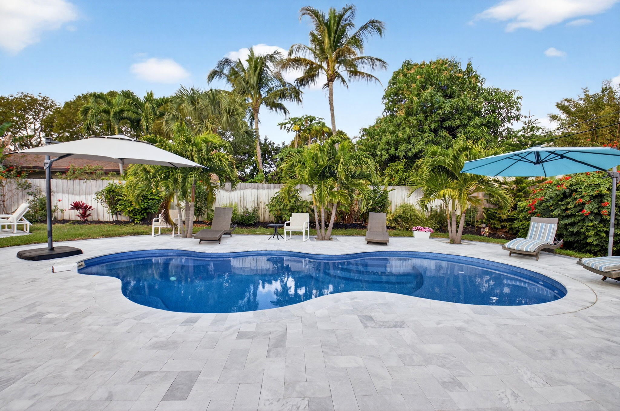 233 Northeast 12th Street Delray Beach, FL 33444 - Photo 46 of 55 a view of swimming pool with sitting area