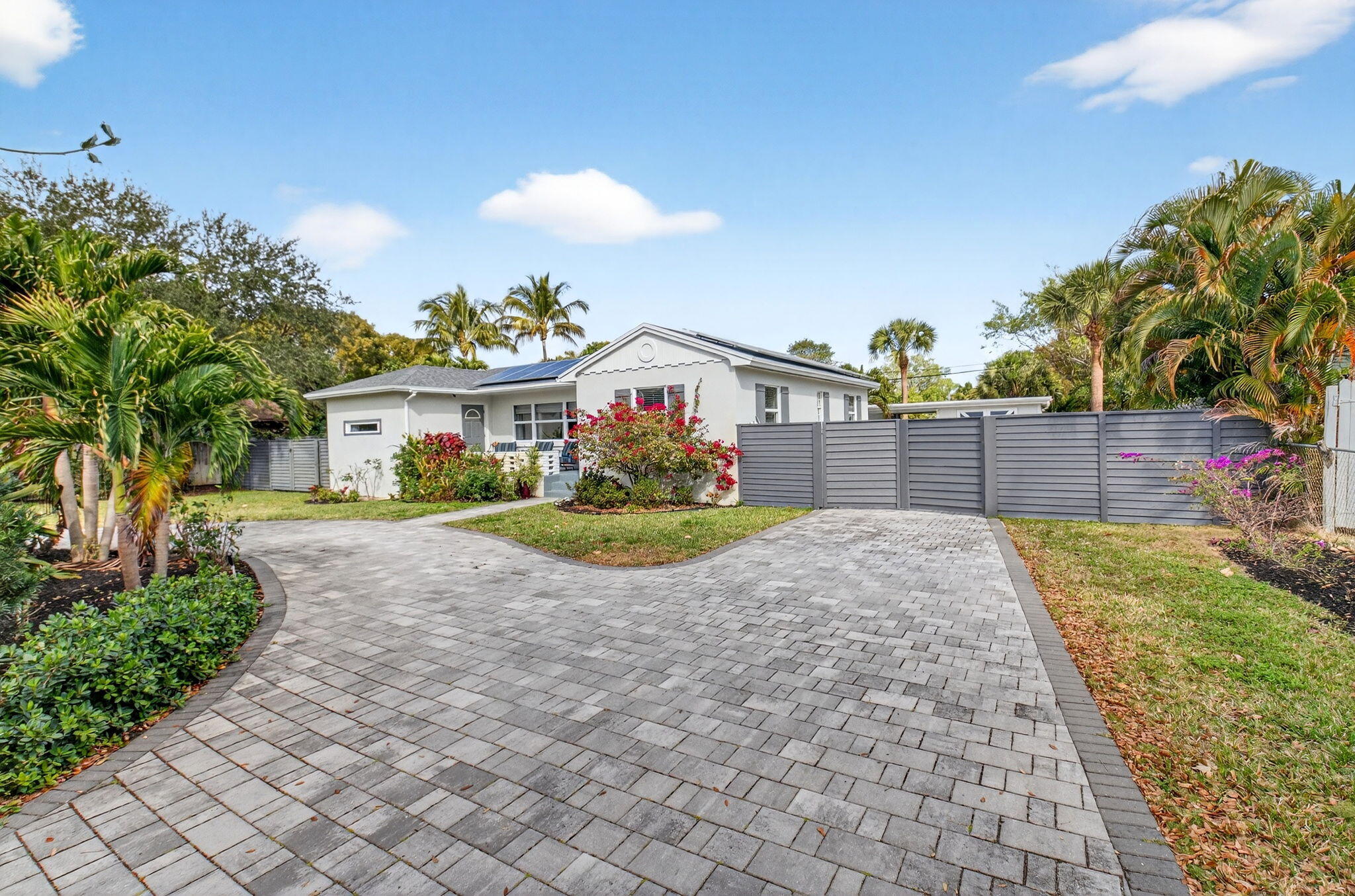 233 Northeast 12th Street Delray Beach, FL 33444 - Photo 5 of 55 a view of house with outdoor space and sitting area