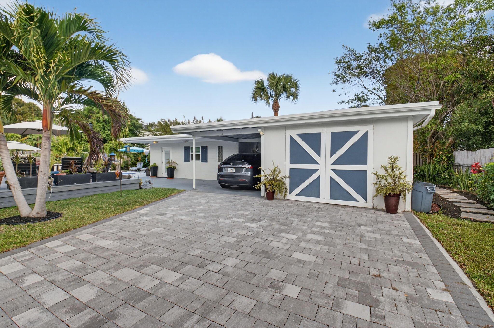 233 Northeast 12th Street Delray Beach, FL 33444 - Photo 51 of 55 a view of house with outdoor space and entertaining space