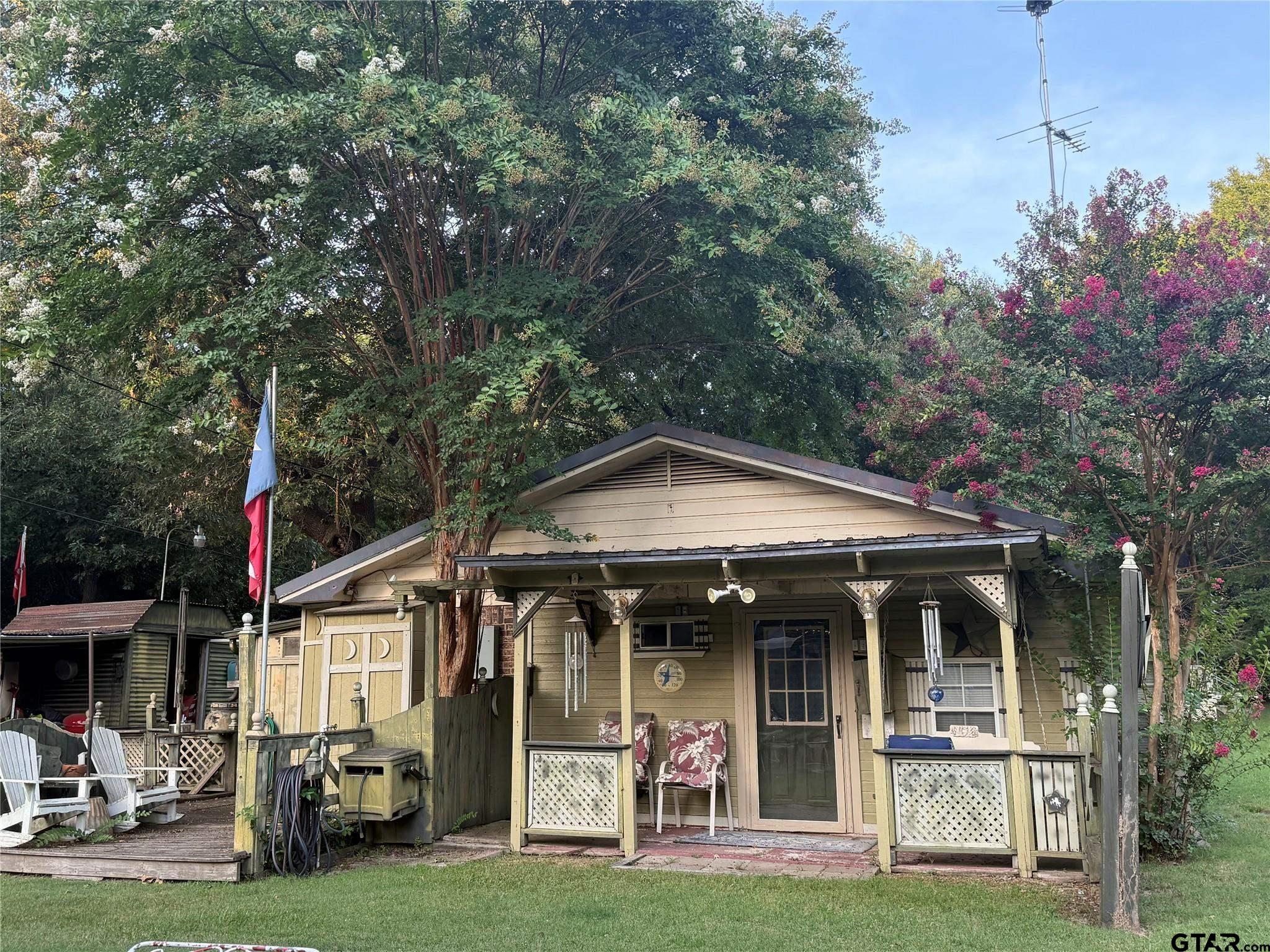 412 South Birch Street Van, TX 75790 - Photo 8 of 9 a front view of a house with garden