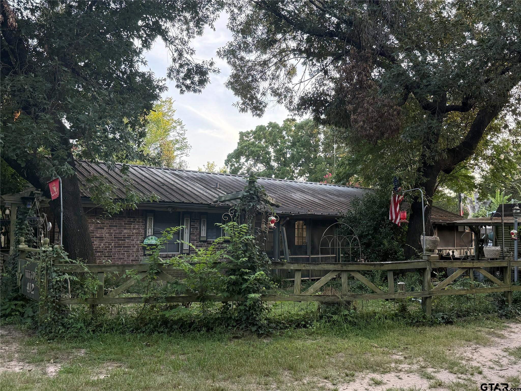 412 South Birch Street Van, TX 75790 - Photo 9 of 9 a view of house with trees in the background
