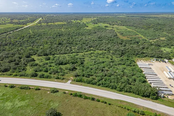 a view of a field with an outdoor space