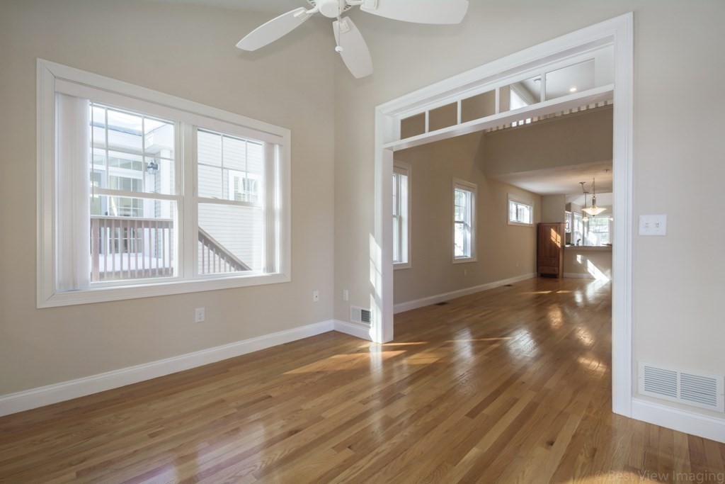 13 Trail Ridge Way, Unit D Harvard, MA 01451 - Photo 18 of 42 a view of livingroom with hardwood floor and hallway