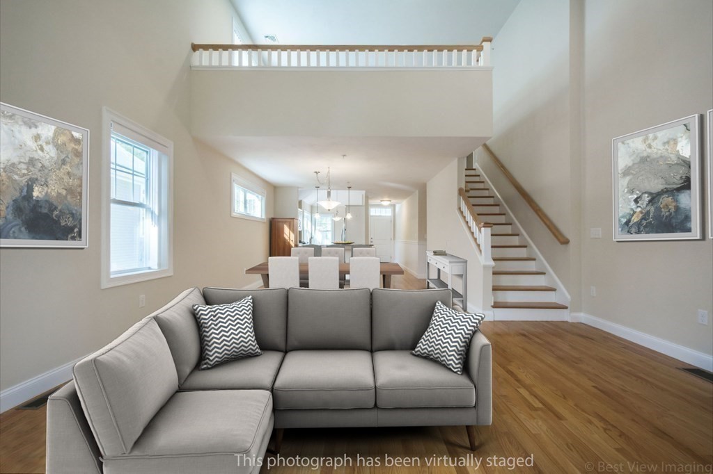 13 Trail Ridge Way, Unit D Harvard, MA 01451 - Photo 2 of 42 a living room with furniture and a window