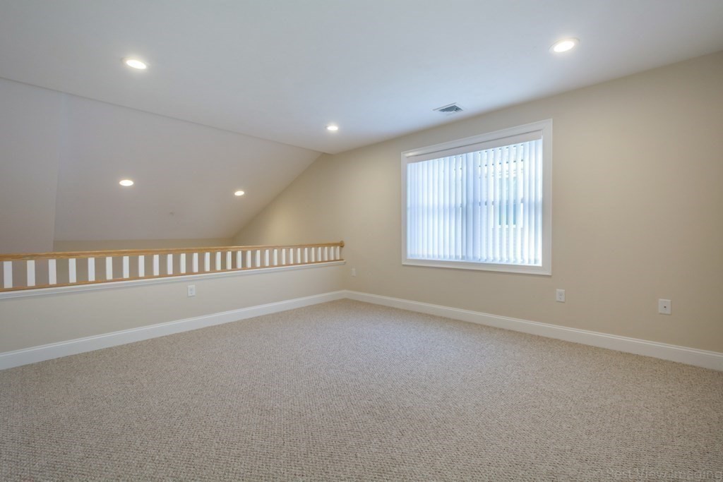 13 Trail Ridge Way, Unit D Harvard, MA 01451 - Photo 28 of 42 an empty room with windows