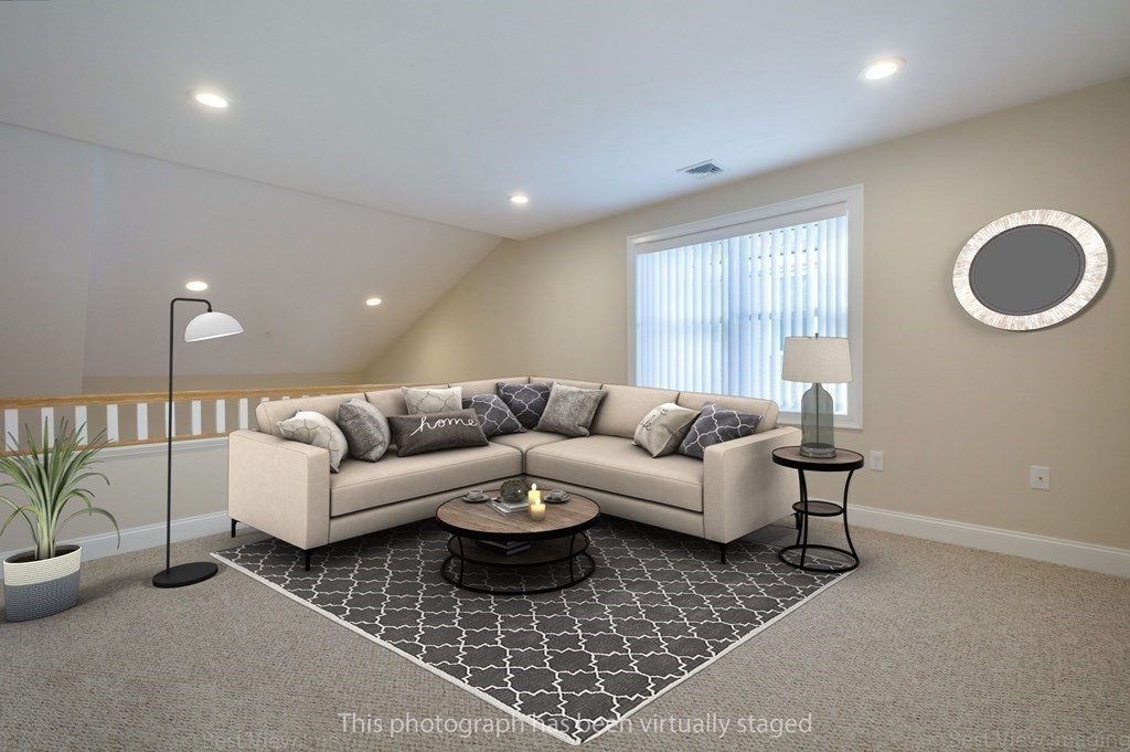 13 Trail Ridge Way, Unit D Harvard, MA 01451 - Photo 29 of 42 a living room with furniture and a window