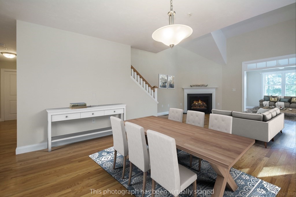 13 Trail Ridge Way, Unit D Harvard, MA 01451 - Photo 3 of 42 a living room with furniture and a table