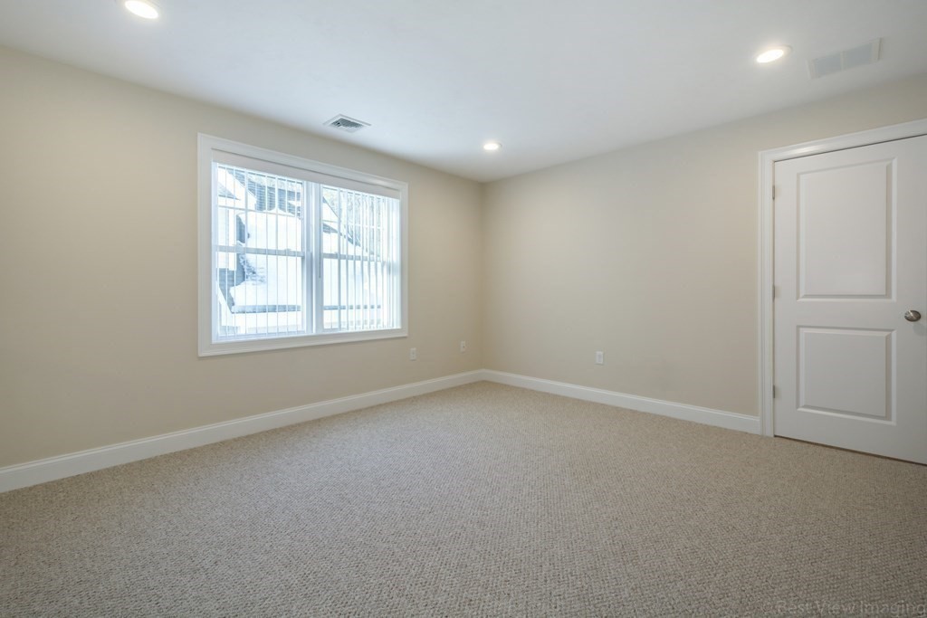 13 Trail Ridge Way, Unit D Harvard, MA 01451 - Photo 31 of 42 an empty room with a window