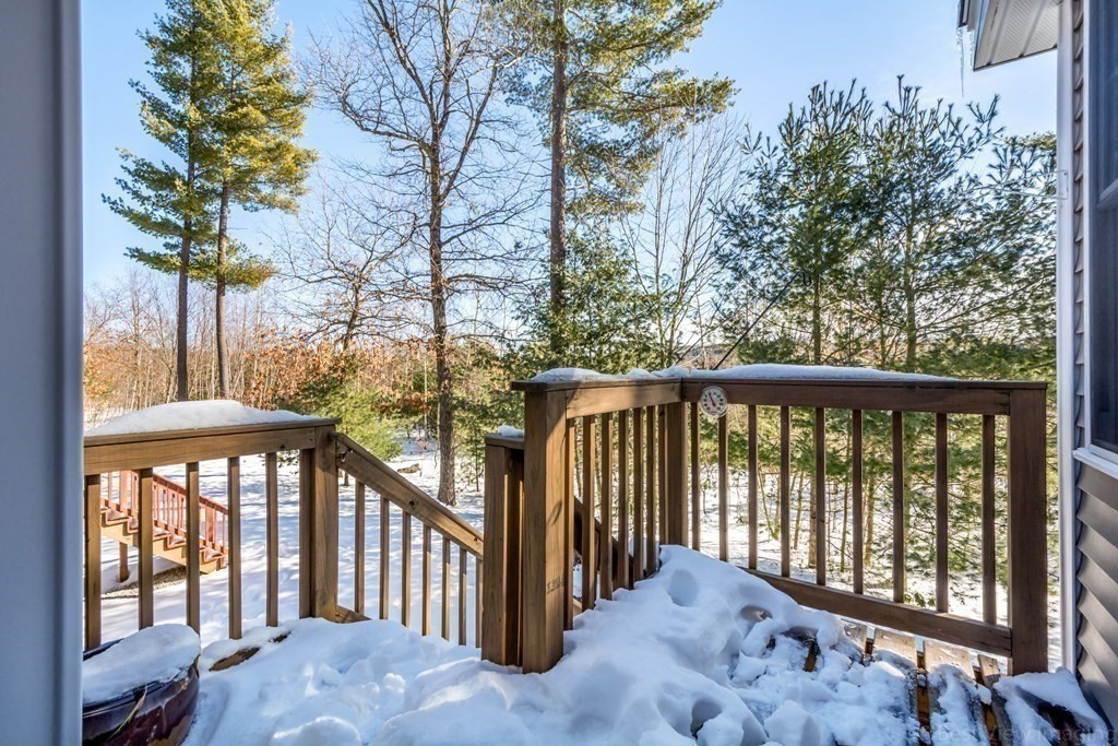 13 Trail Ridge Way, Unit D Harvard, MA 01451 - Photo 36 of 42 a view of a porch with a yard
