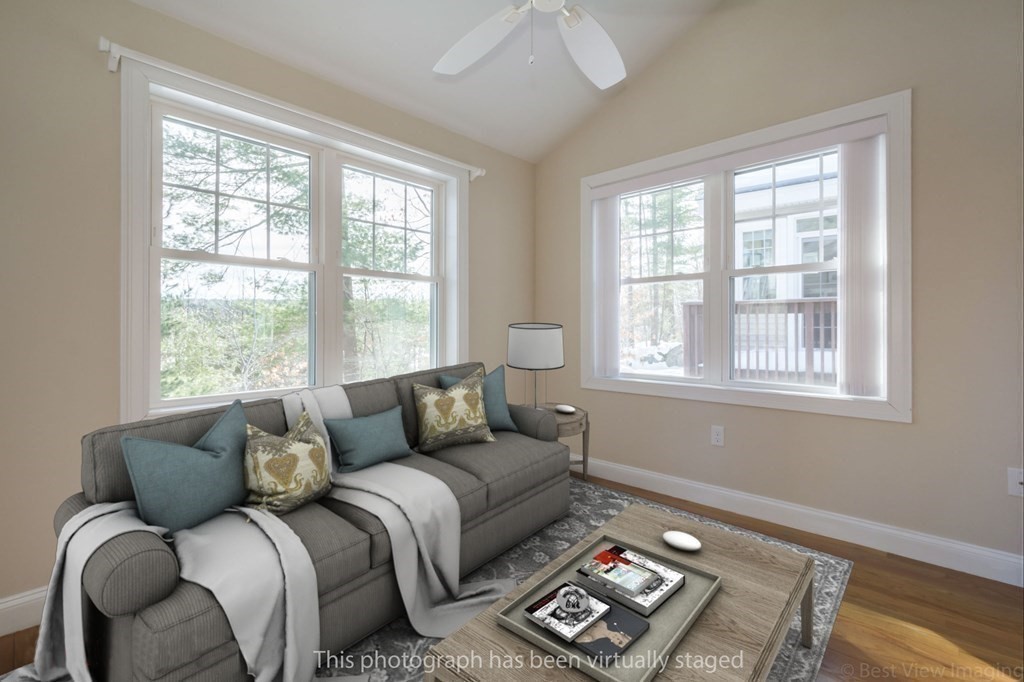 13 Trail Ridge Way, Unit D Harvard, MA 01451 - Photo 4 of 42 a living room with furniture and a window