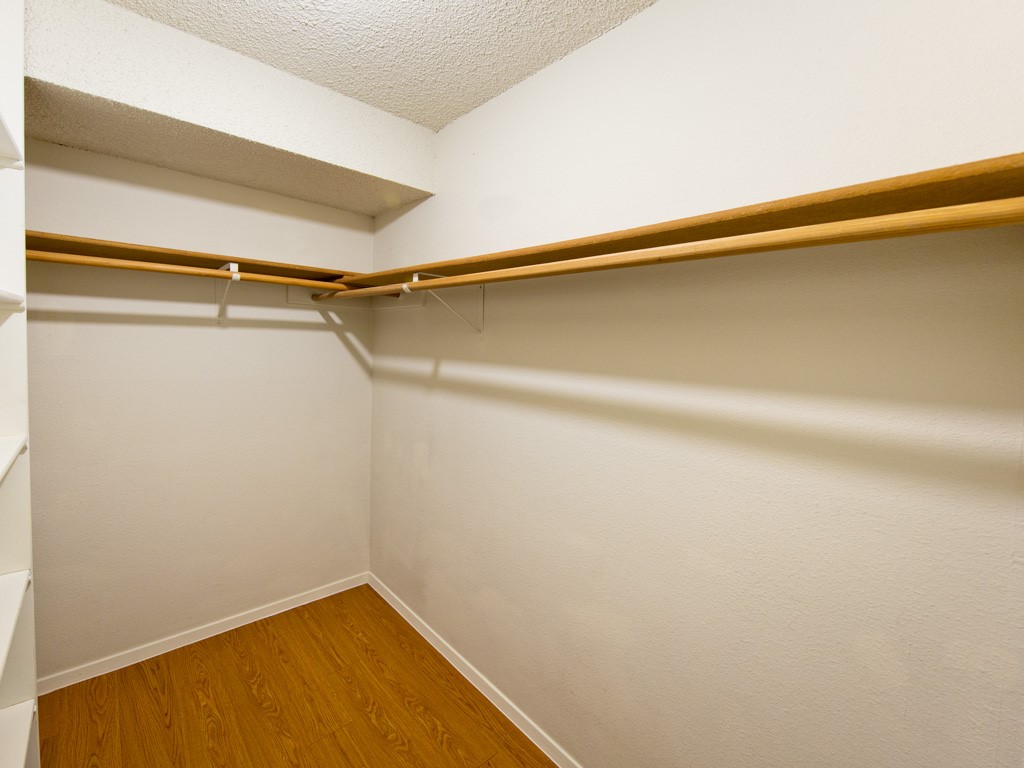 3839 Dry Creek Drive, Unit 220 Austin, TX 78731 - Photo 16 of 26 a view of a room with racks on the wall