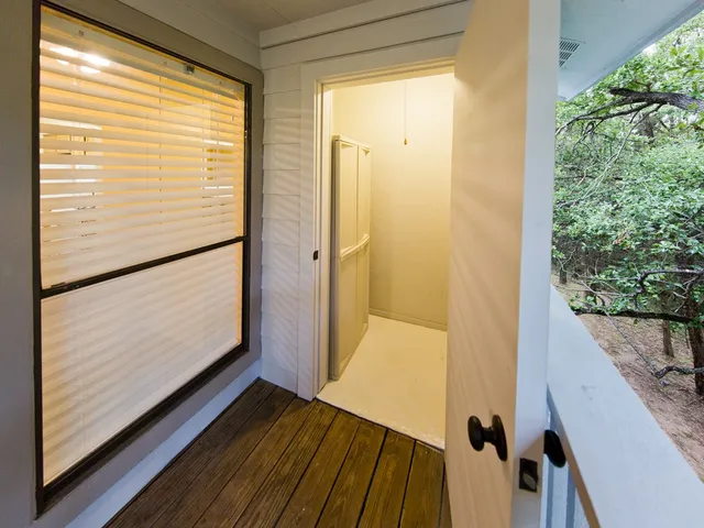 a view of a yard with a tree