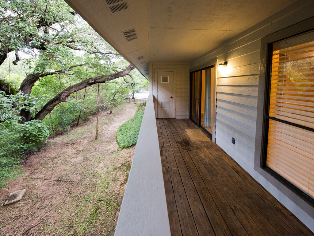 3839 Dry Creek Drive, Unit 220 Austin, TX 78731 - Photo 24 of 26 a view of a pathway both side of house