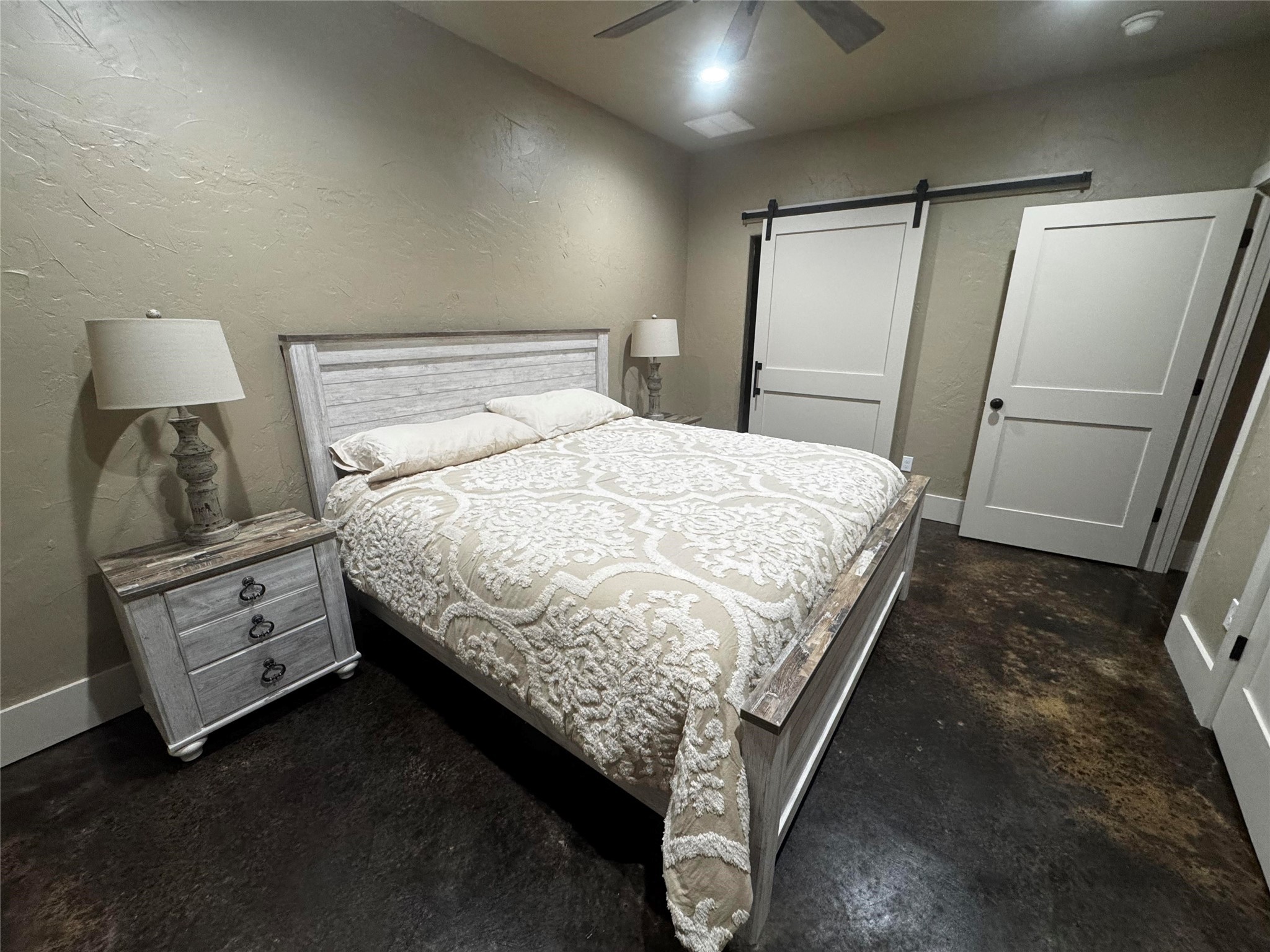 72 Circle Hook Port Port O'Connor, TX 77982 - Photo 14 of 43 a bed sitting in a room next to a lamp