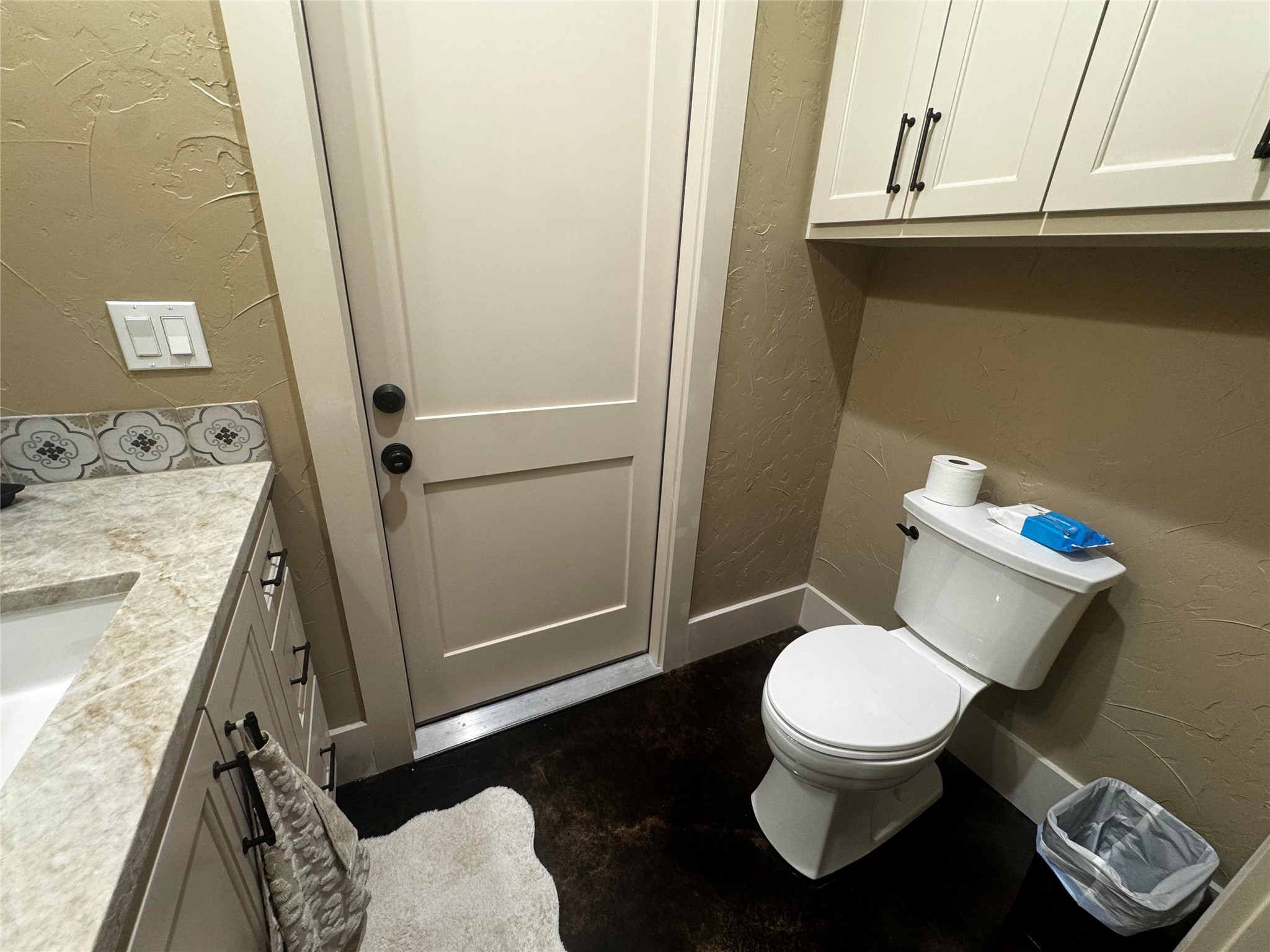 72 Circle Hook Port Port O'Connor, TX 77982 - Photo 16 of 43 a white toilet sitting next to a bathroom sink