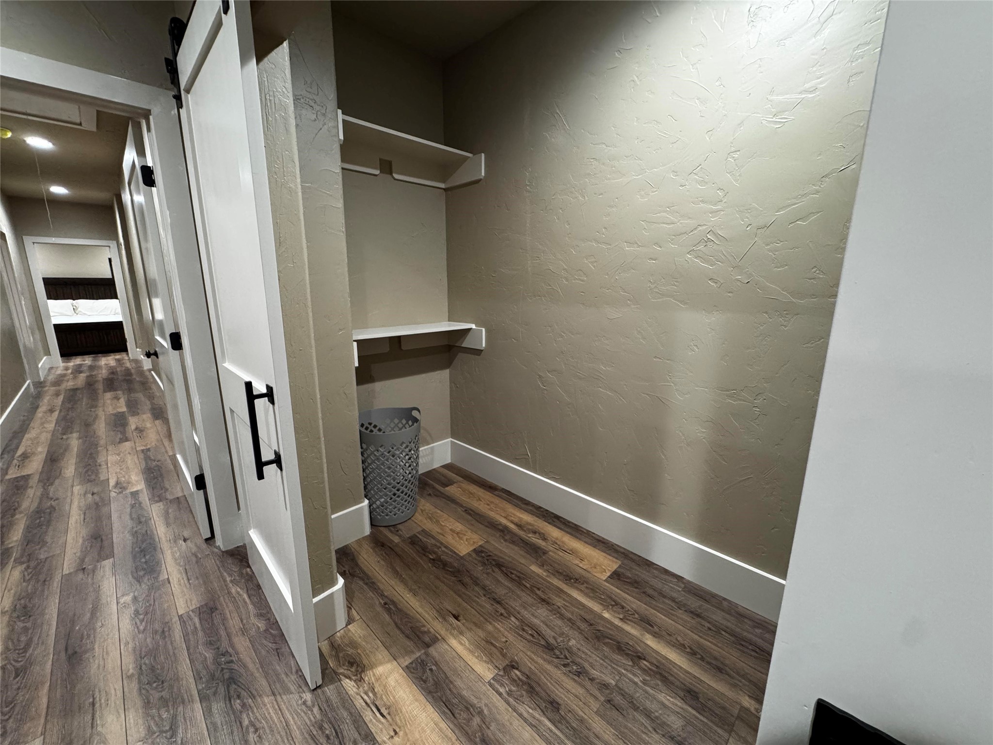 72 Circle Hook Port Port O'Connor, TX 77982 - Photo 37 of 43 a view of a hallway with wooden floor and staircase